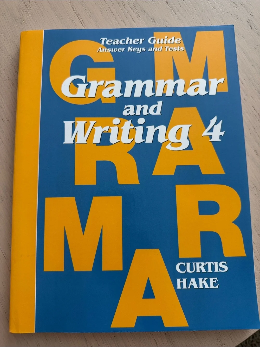 Grammar and Writing 4 Student Workbook by — Blue & Orange
